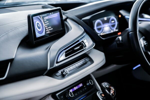 Luxury car interior showcasing advanced dashboard technology and sleek design elements.