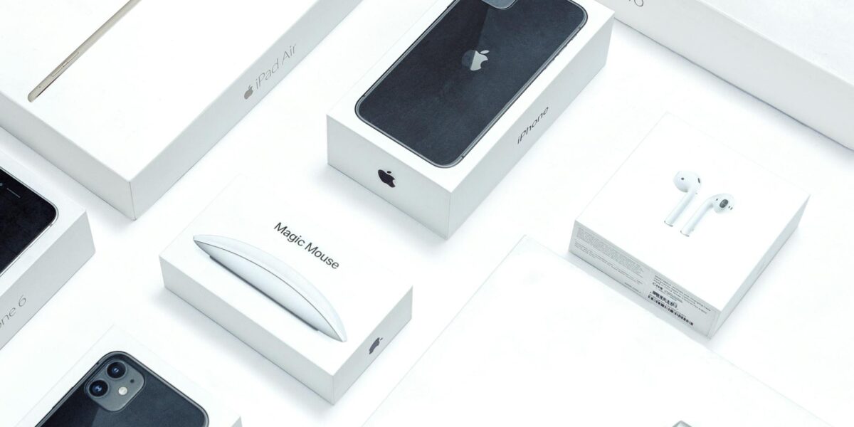 Flat lay of assorted Apple product boxes showcasing technology packaging design.