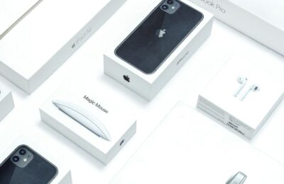 Flat lay of assorted Apple product boxes showcasing technology packaging design.