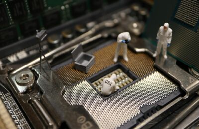 Tiny CSI figures conduct an investigation on a CPU, blending technology with creativity.