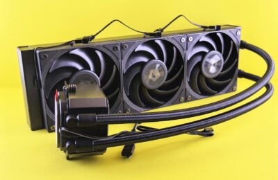 Triple fan liquid cooling system for efficient PC cooling on bright yellow background.