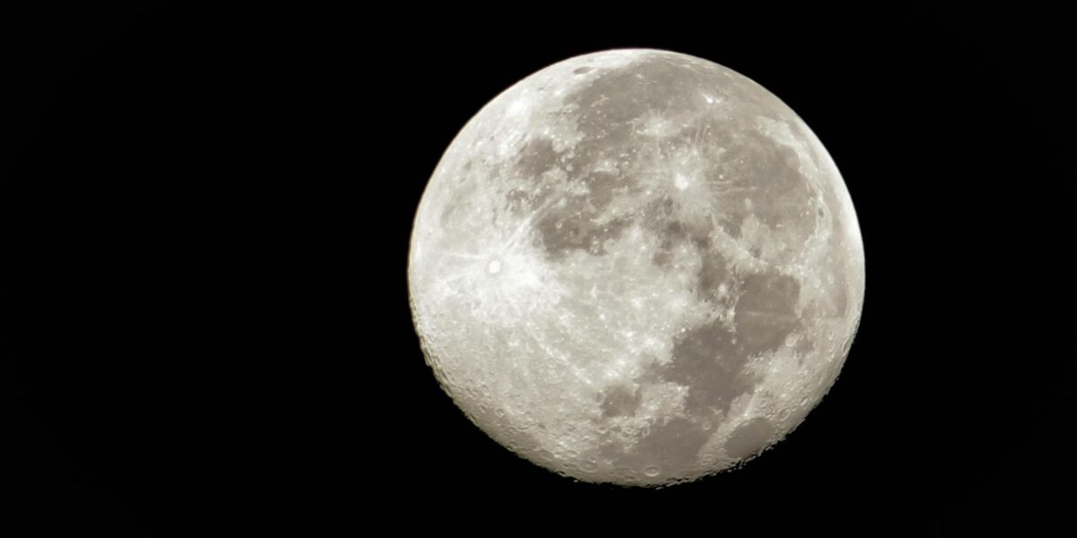 Bright full moon with detailed craters in a clear night sky, captured in high resolution.