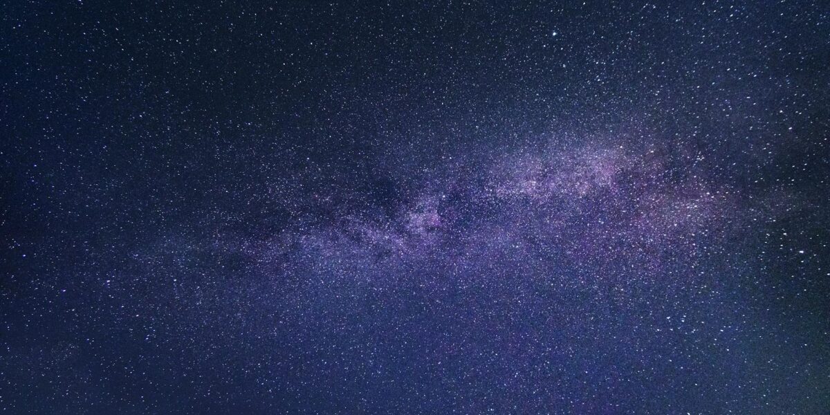 A breathtaking photo of the Milky Way galaxy captured on a clear night sky, showcasing the beauty of the cosmos.