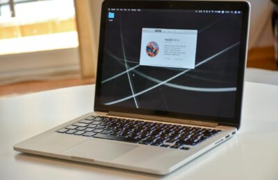 A stylish MacBook Pro laptop showcasing macOS Sierra, highlighting modern technology and design.
