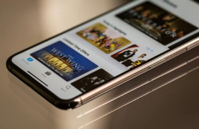 Close-up view of a smartphone featuring a streaming service interface, highlighting technology in modern entertainment.