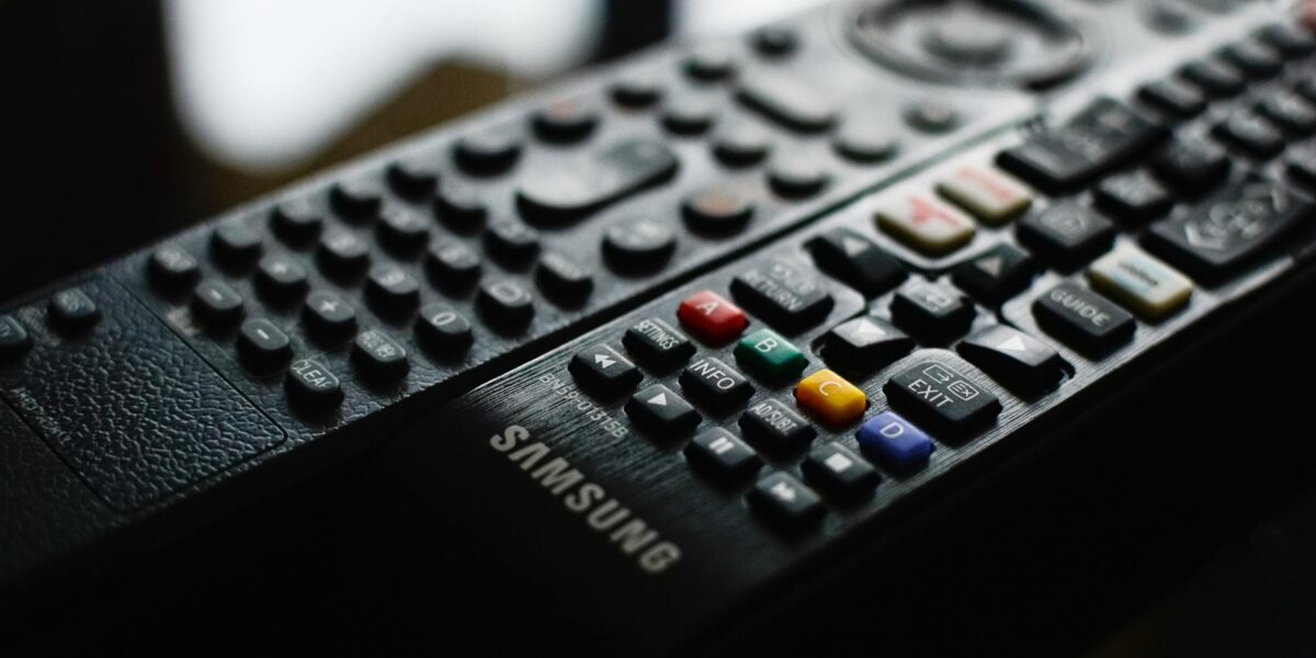 Detailed close-up of a Samsung remote control showcasing buttons and logo.