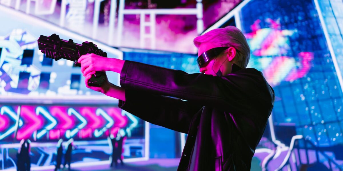 Person in cyberpunk attire aims futuristic gun in neon-lit scene