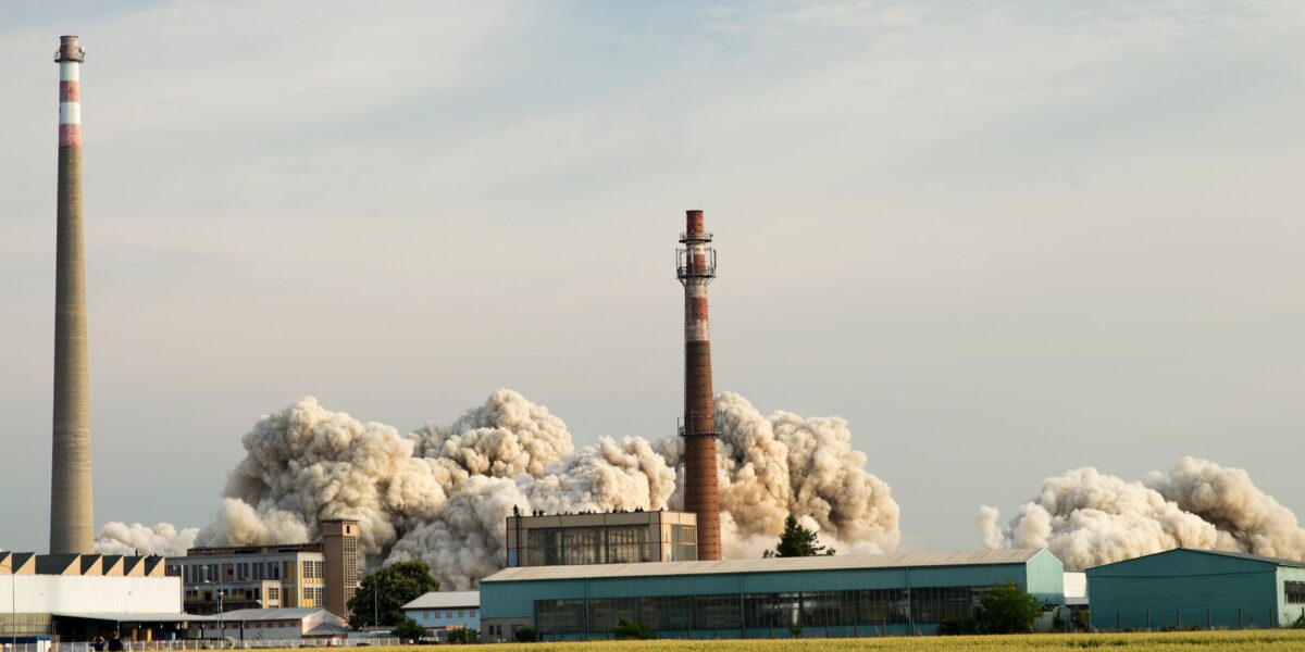 Smoke billows from an industrial factory in Prostějov, Czech Republic, showcasing industrial activity.