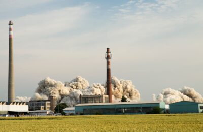 Smoke billows from an industrial factory in Prostějov, Czech Republic, showcasing industrial activity.