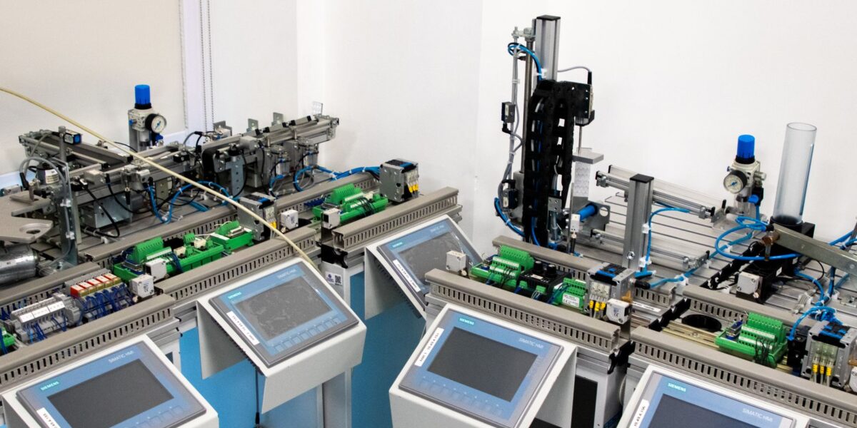 High-tech industrial automation system with control panels indoors.