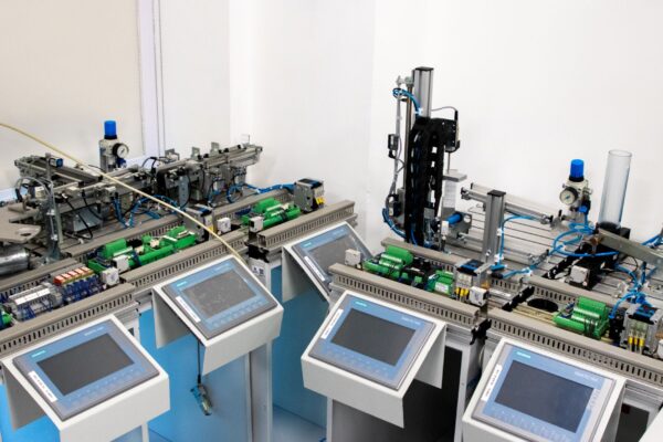 High-tech industrial automation system with control panels indoors.