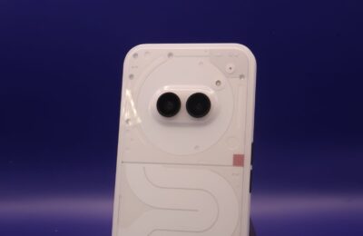 A sleek smartphone with dual cameras against a vibrant blue background.