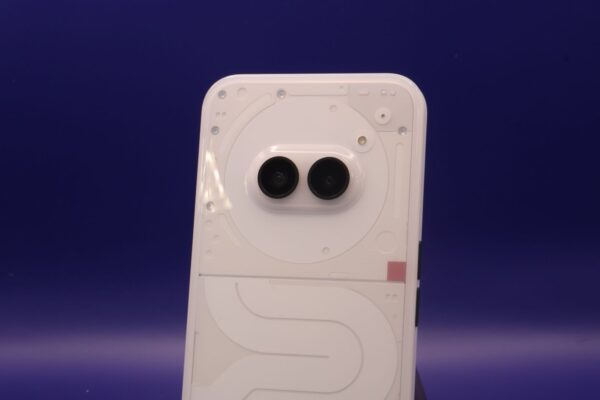 A sleek smartphone with dual cameras against a vibrant blue background.