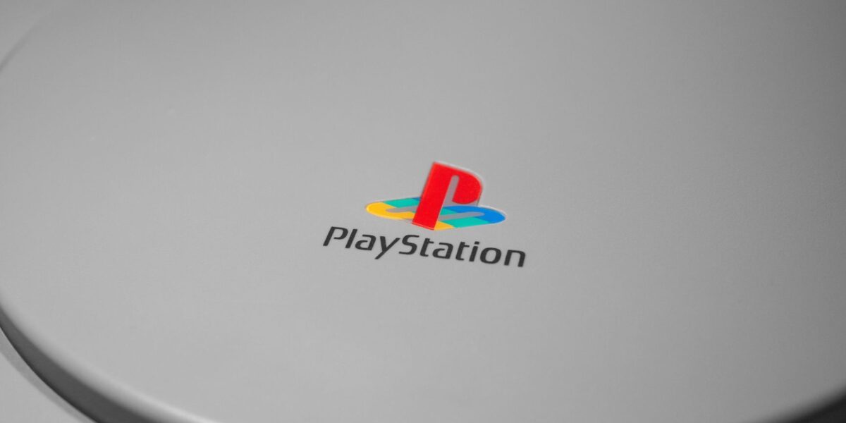 Detailed close-up of iconic PlayStation console logo, perfect for gaming-related content.