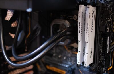 Detailed close-up of computer components including RAM and cables inside a server or high-performance PC.