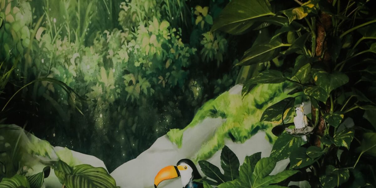 A colorful toucan amidst lush jungle foliage, capturing vibrant wildlife beauty.