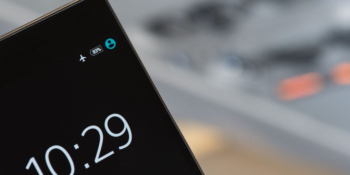 Focused image of a smartphone showing a 10:29 time with blurred background.