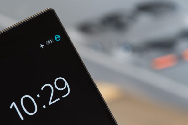 Focused image of a smartphone showing a 10:29 time with blurred background.