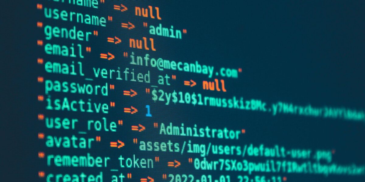 Vibrant close-up of code displayed on a monitor with various programming details.