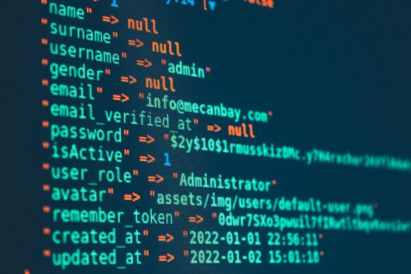 Vibrant close-up of code displayed on a monitor with various programming details.