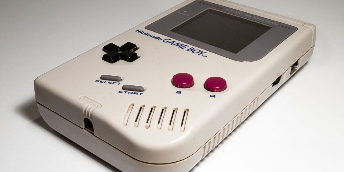 Close-up of a classic Nintendo Game Boy handheld console, iconic retro gaming device.