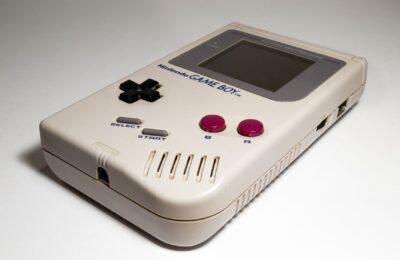 Close-up of a classic Nintendo Game Boy handheld console, iconic retro gaming device.