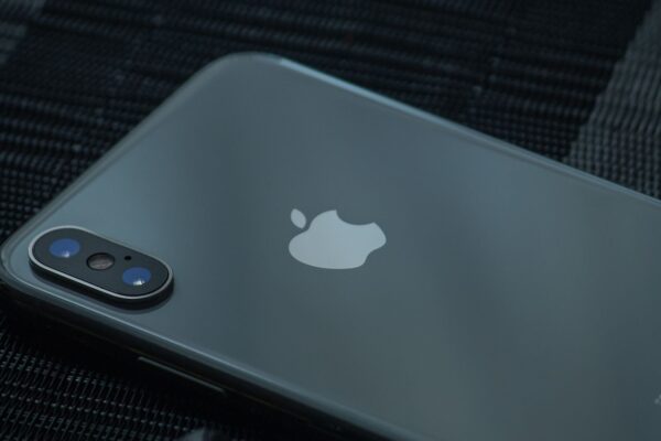 High-quality close-up of a sleek smartphone's back, showcasing the camera and logo.