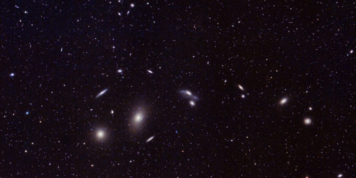 Captivating image of distant galaxies and star clusters in the vast universe. Perfect for astronomy enthusiasts.