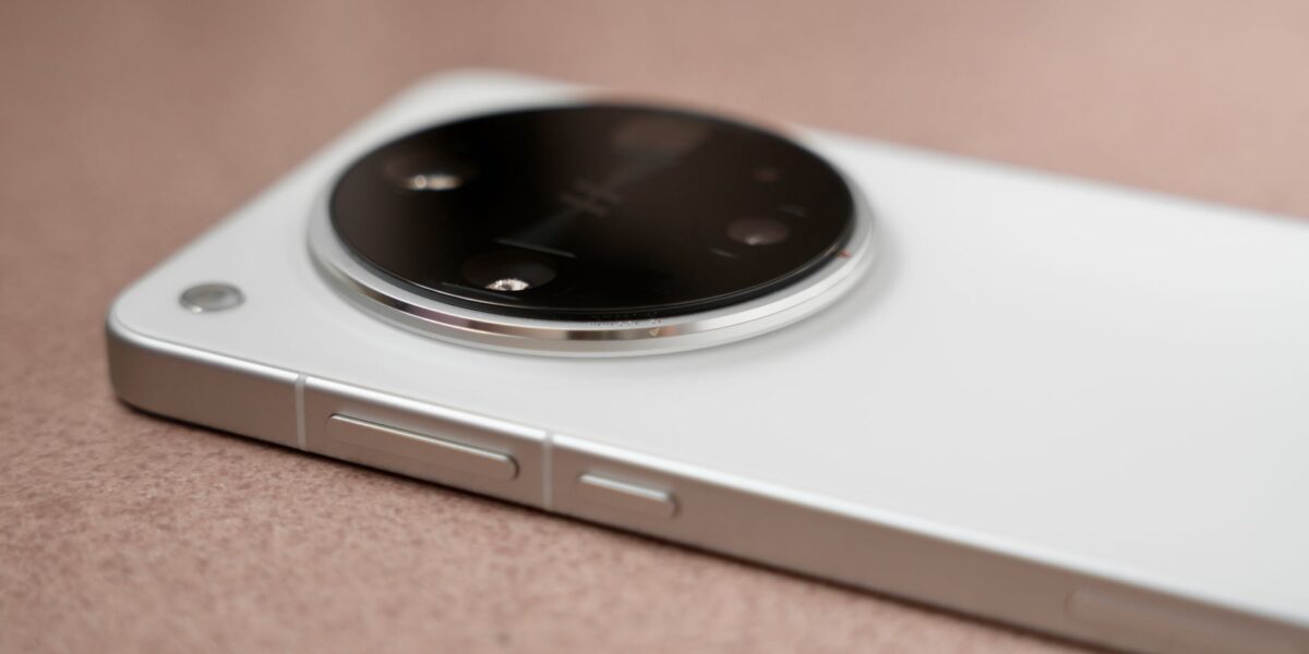 Detailed shot of a smartphone's sleek camera module, showcasing its design and features.