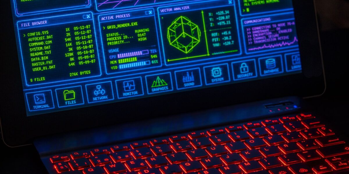 Futuristic digital interface displayed on laptop screen with neon red keyboard.